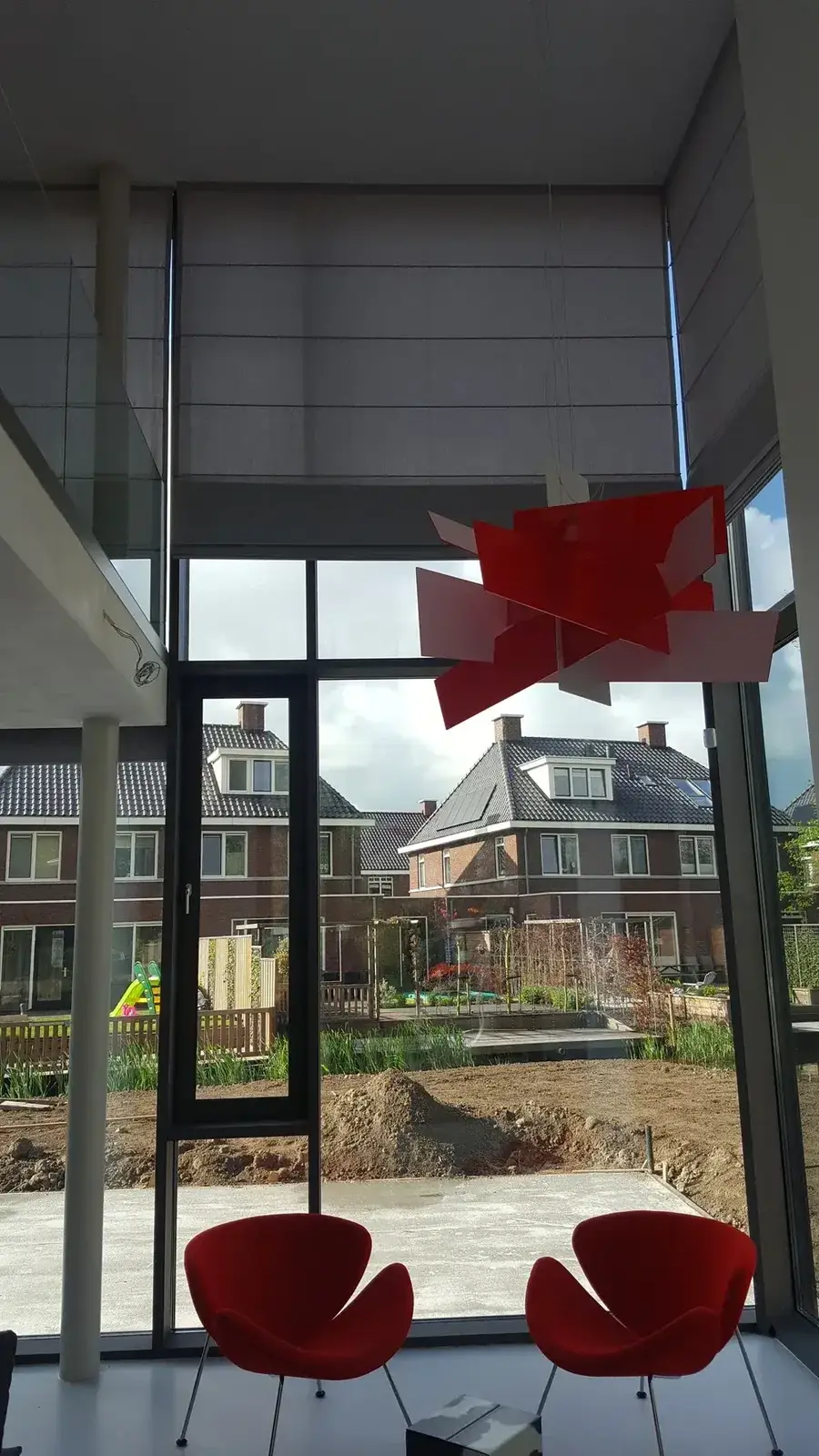 Hoge vouwgordijnen voor een grote raamhoogte