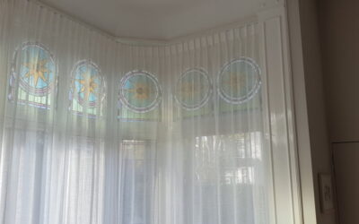 Gordijnen aan een railroede